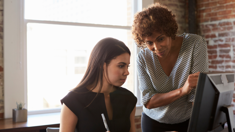 Experienced leader mentoring an emerging leader as part of succession planning in local government