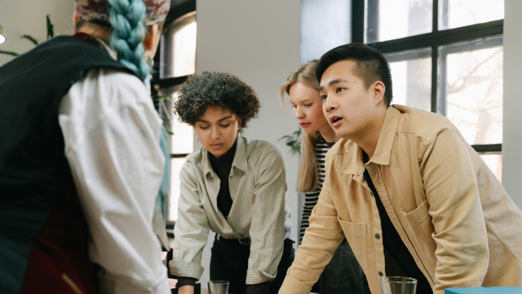 Team members collaborating during a workplace discussion